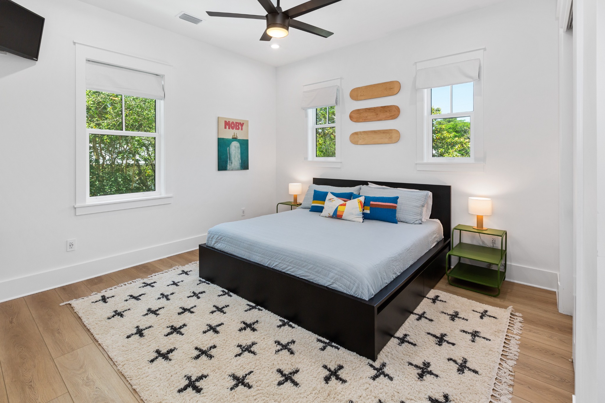 Master suite with king bed and pendant light