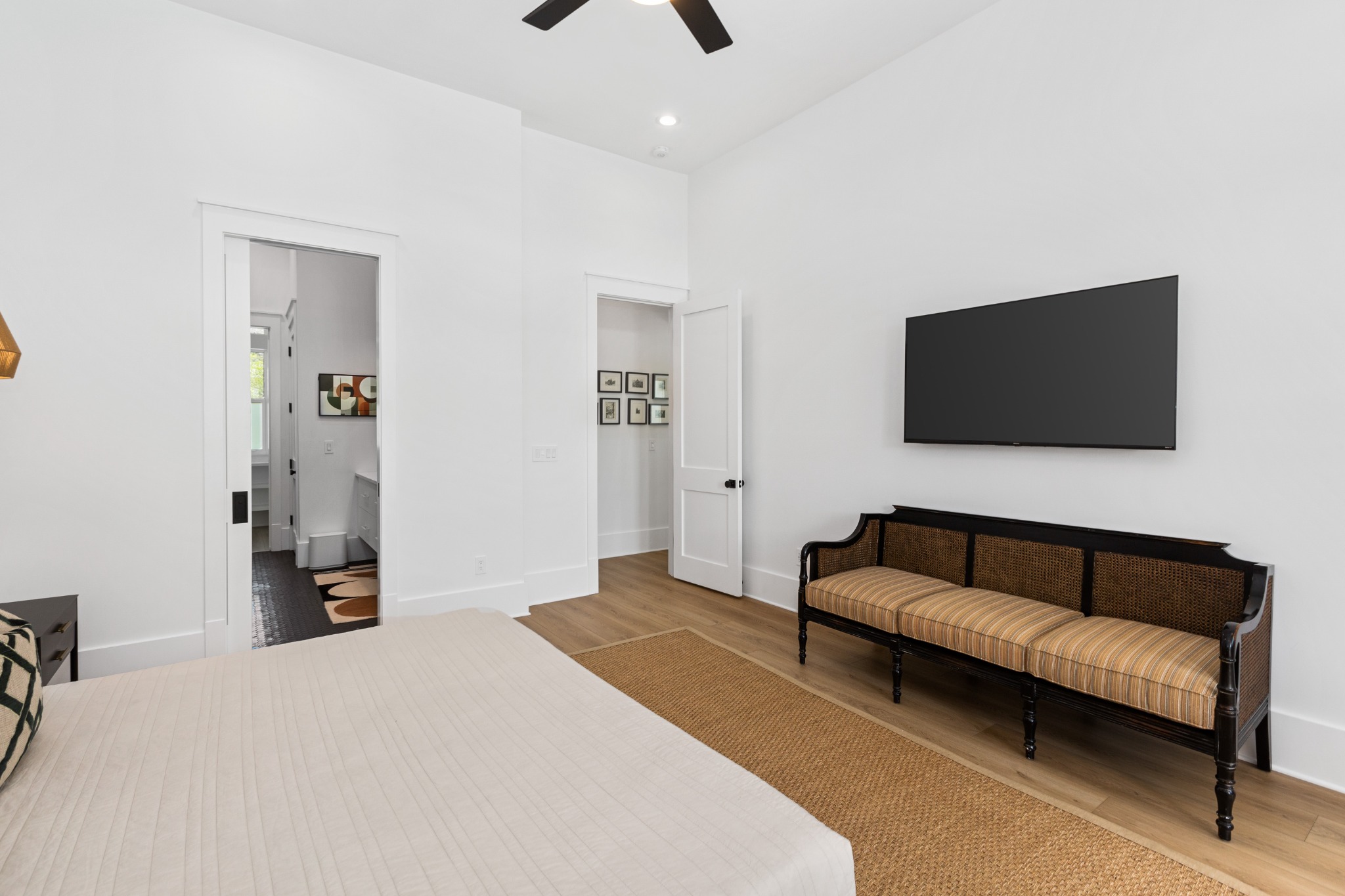 Bedroom with bench seating and natural light