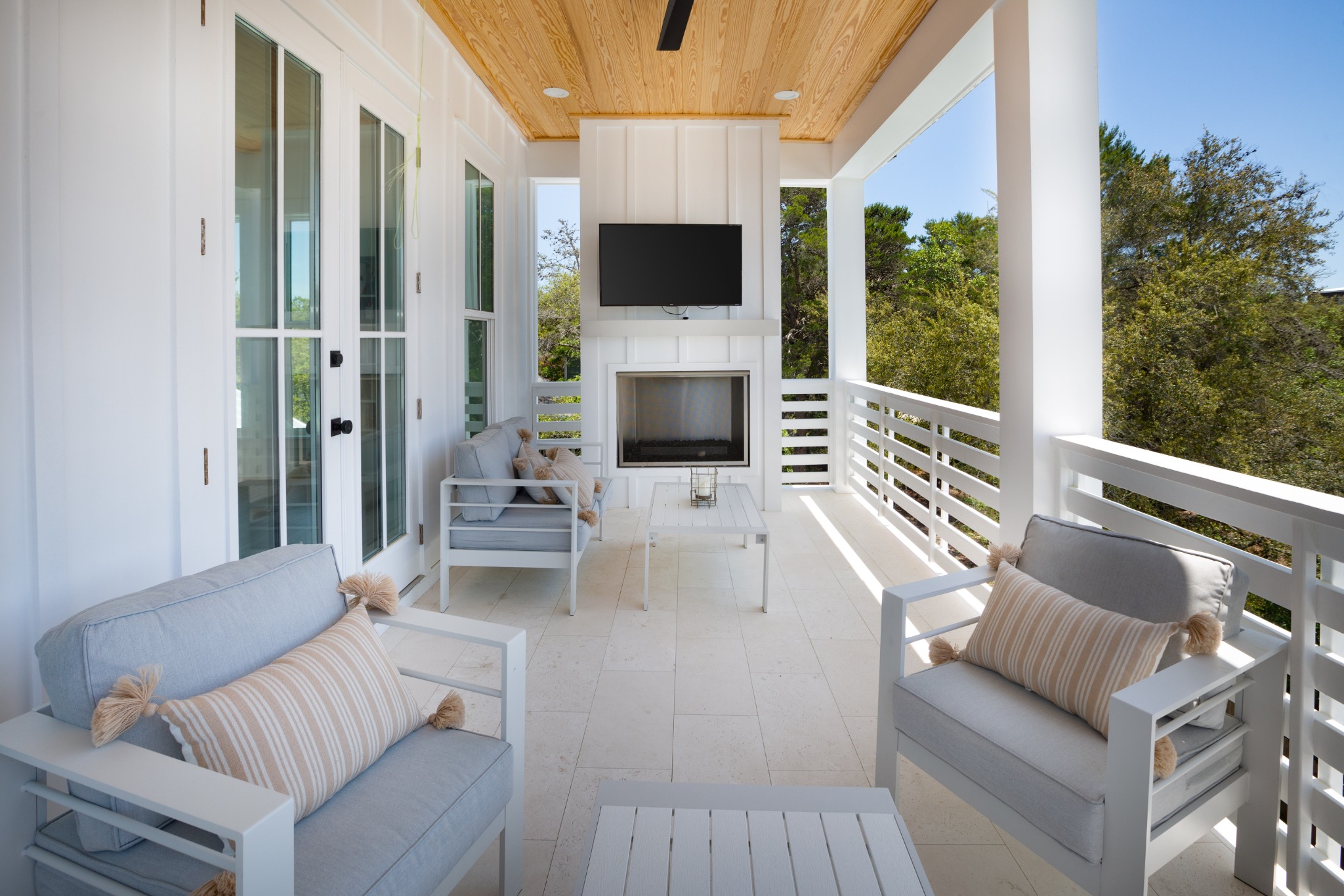 Upstairs porch with rocking chairs