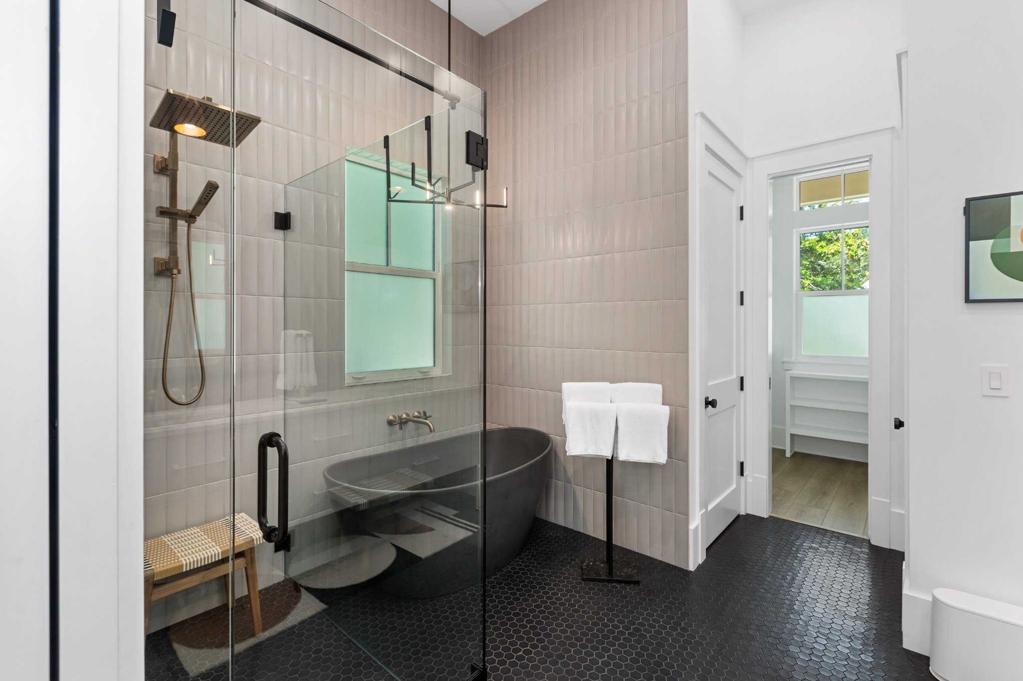Bathroom with walk-in shower and freestanding soaking tub