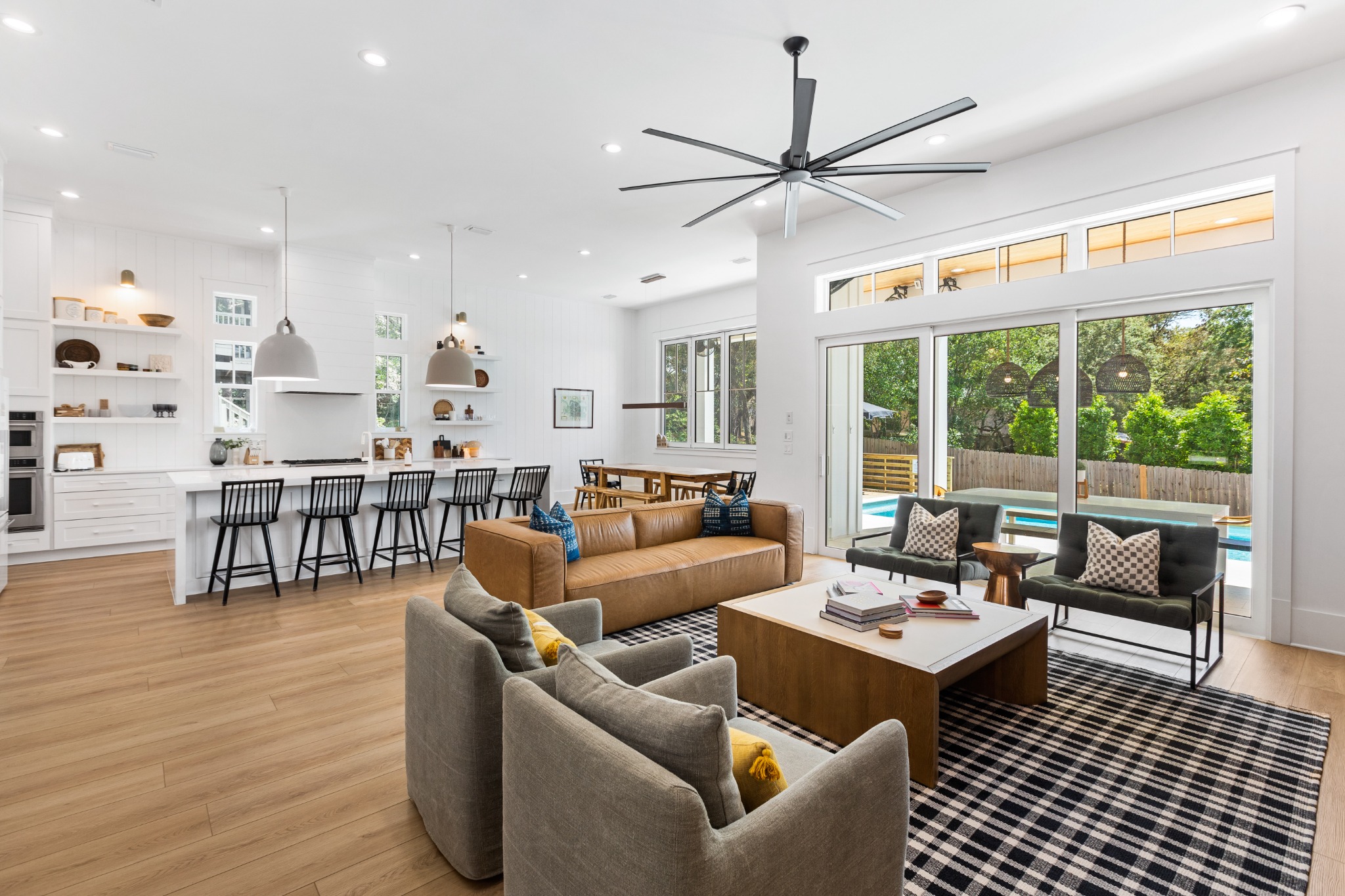 Living room with sectional and ceiling fan