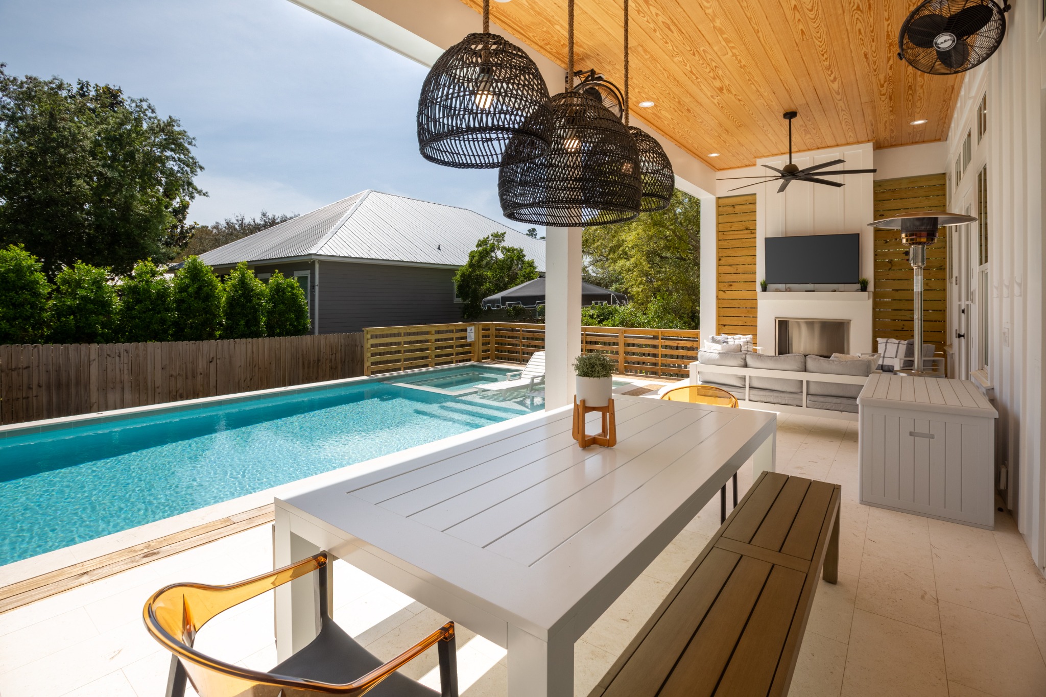 Pool with hot tub and outdoor seating