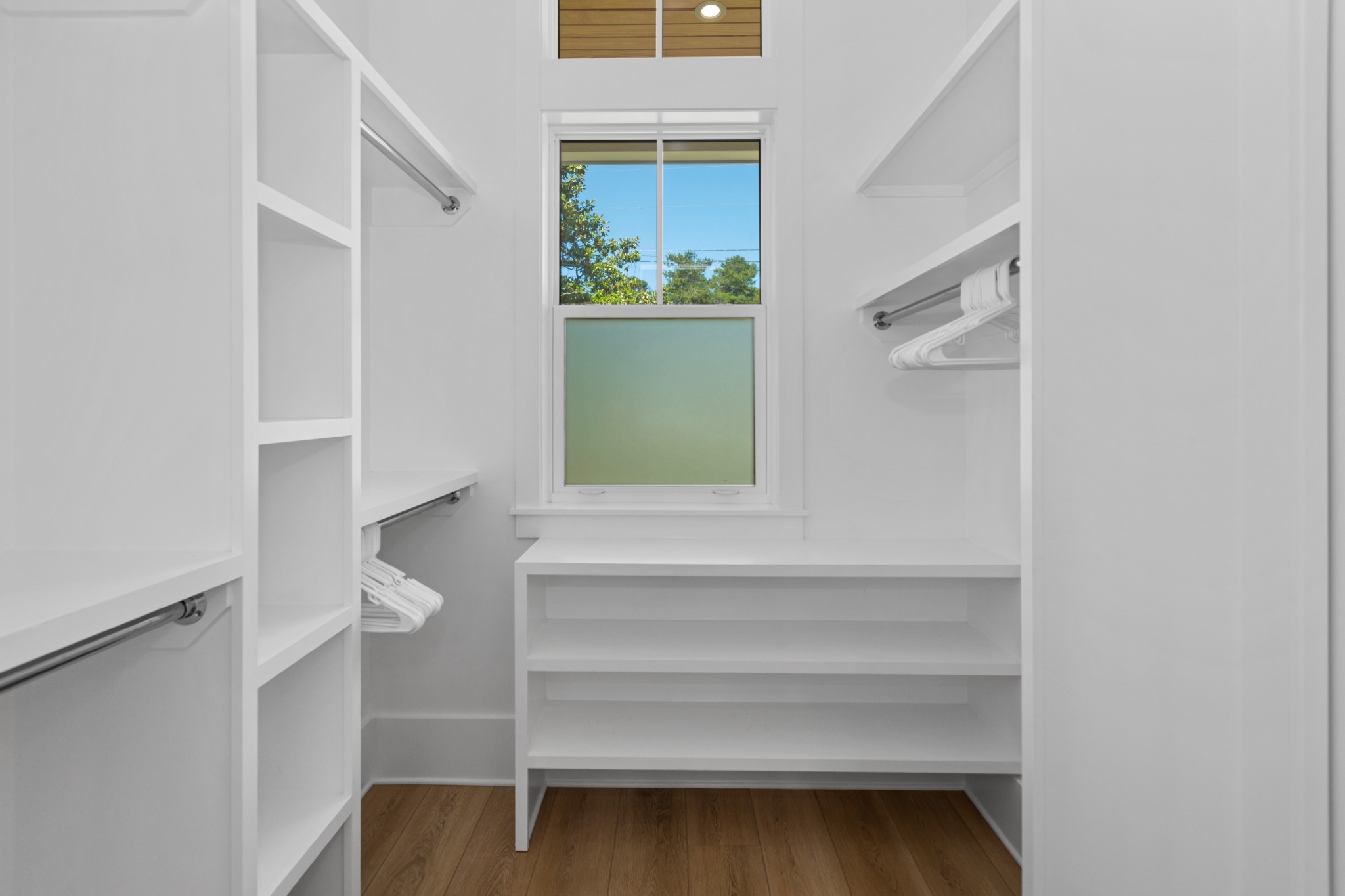 Walk-in closet with built-in shelving