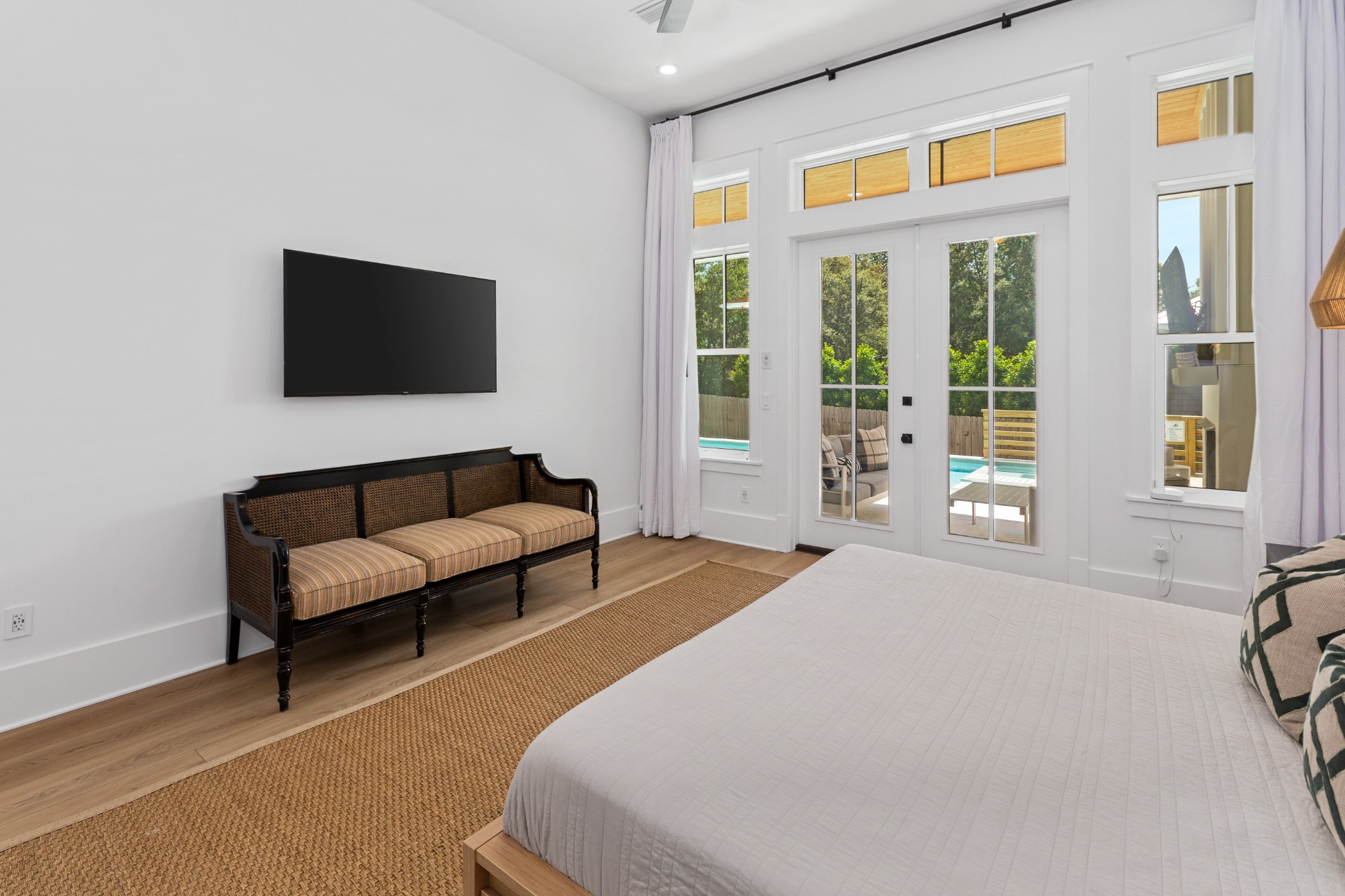 Master bedroom with king bed and a quiet palette